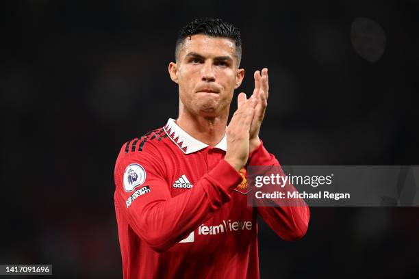 Cristiano Ronaldo of Manchester United applauds the fans following victory in the Premier League match between Manchester United and Liverpool FC at...