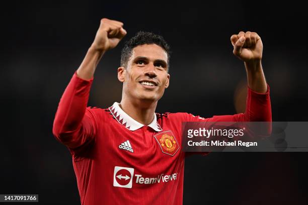 Raphael Varane of Manchester United celebrates after victory in the Premier League match between Manchester United and Liverpool FC at Old Trafford...