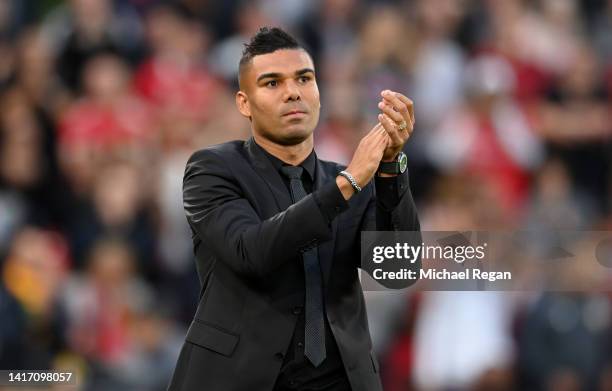 New signing, Casemiro of Manchester United applauds the fans prior to the Premier League match between Manchester United and Liverpool FC at Old...