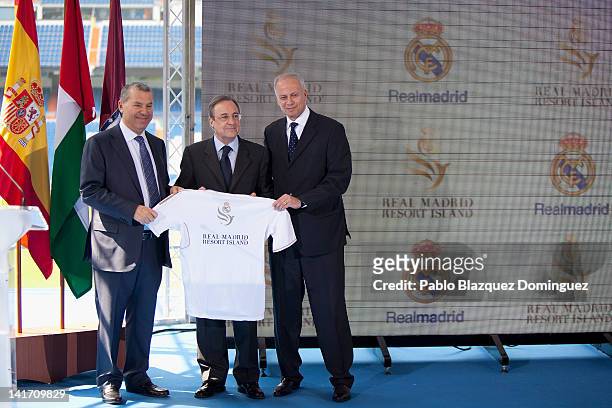 Representative of the government of the United Arab Emirates, Khater Massaad, Real Madrid's President Florentino Perez and Louis Armand de Rouge, CEO...