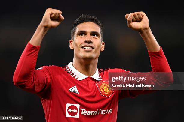 Raphael Varane of Manchester United celebrates after victory in the Premier League match between Manchester United and Liverpool FC at Old Trafford...