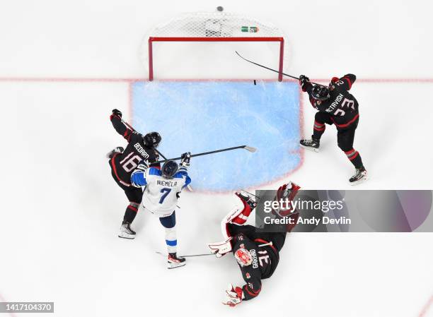 Mason McTavish of Canada makes a save with his stick in overtime against Finland in the IIHF World Junior Championship on August 20, 2022 at Rogers...