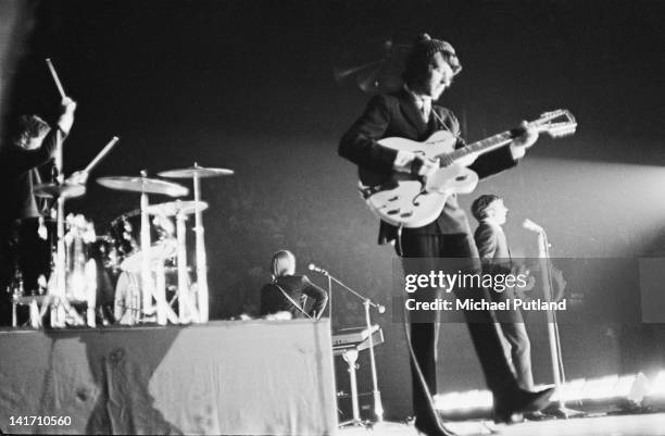 American pop group The Monkees performing at Wembley Empire Pool, London, 2nd July 1967. Left to right: Mickey Dolenz, Peter Tork, Mike Nesmith and...