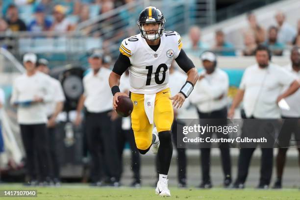 Mitch Trubisky of the Pittsburgh Steelers runs the ball during the first half of a preseason game against the Jacksonville Jaguars at TIAA Bank Field...