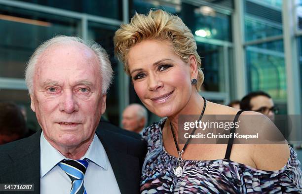 Coach Udo Lattek and Claudia Effenberg pose during the coaching and technical development course awarding ceremony at Kameha Grand Hotel on March 21,...