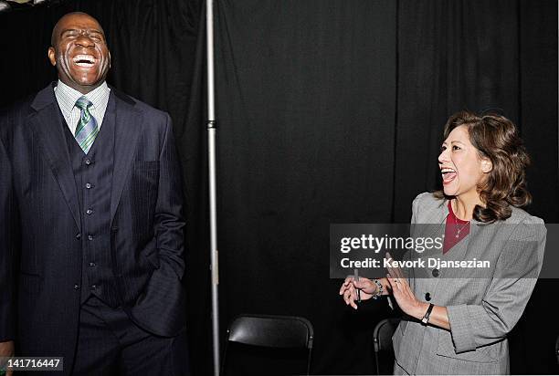 Chairman and CEO of Magic Johnson Enterprises Earvin "Magic" Johnson and U.S. Department of Labor Secretary Hilda Solis laugh during a Urban Economic...