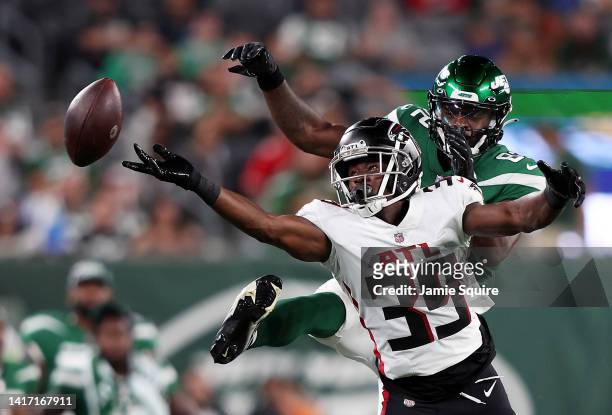 Cornerback Corey Ballentine of the Atlanta Falcons breaks up a pass intended for wide receiver Irvin Charles of the New York Jets during the 1st half...