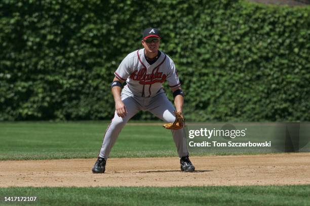 Chipper Jones of the Atlanta Braves gets ready to field his position at third base during MLB game action against the Chicago Cubs at Wrigley Field...
