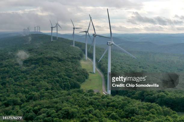 In this aerial view, turbines that are part of Constellation Energy's Criterion Wind Project stand in a row along the top of Backbone Mountain on...