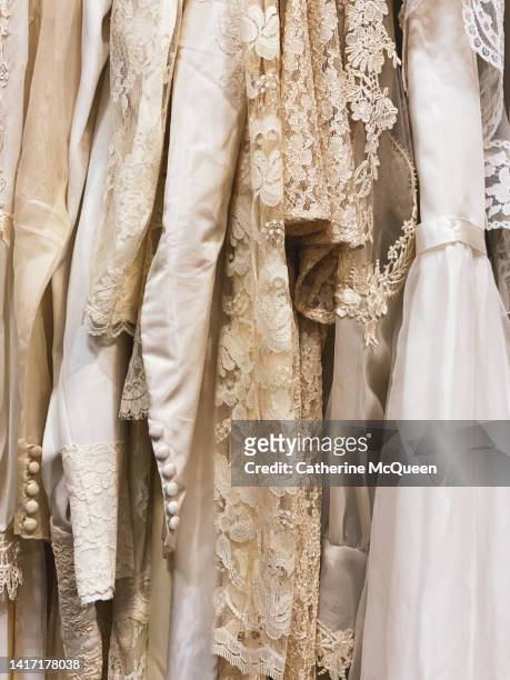 rack of vintage wedding dresses - förvaringsställ bildbanksfoton och bilder