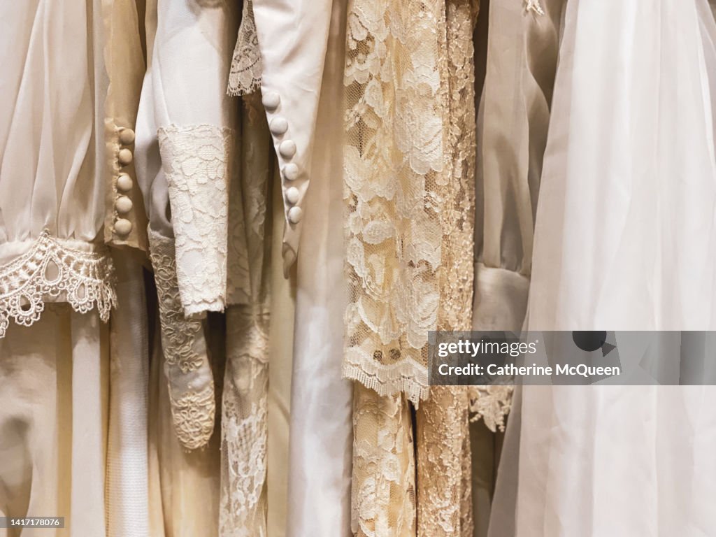Rack of vintage wedding dresses