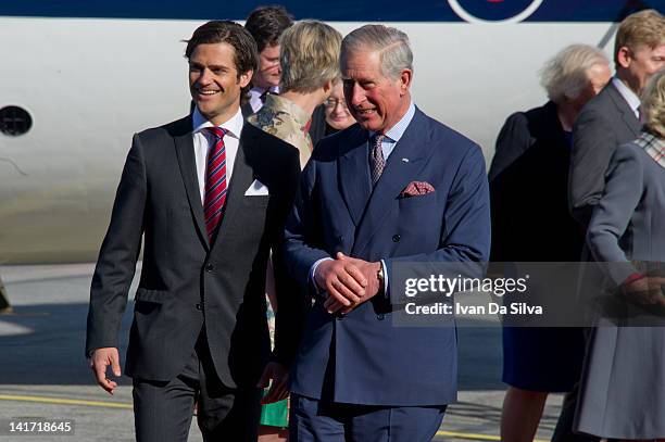 Prince Charles, Prince of Wales is greeted by Prince Carl Philip of Sweden as he arrives at Arlanda Airport on the first day of a state visit to...