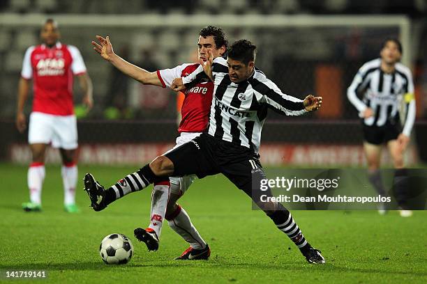 Dirk Marcellis of AZ and Everton of Heracles battle for the ball during the Dutch Cup semi final match between AZ Alkmaar and SC Heracles Almelo at...