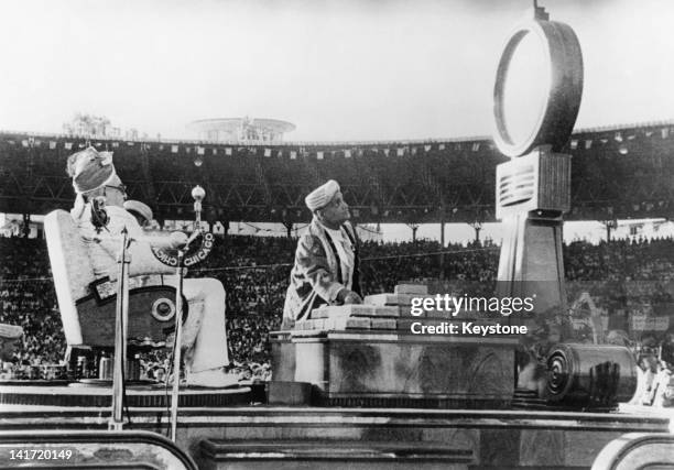 Shia Ismaili Muslim leader Aga Khan III measures his own weight in diamonds during his Diamond Jubilee, at the Brabourne Stadium in Mumbai, India,...