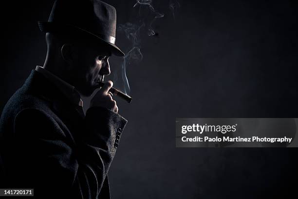 boss smoking, gangster - organized crime stock-fotos und bilder