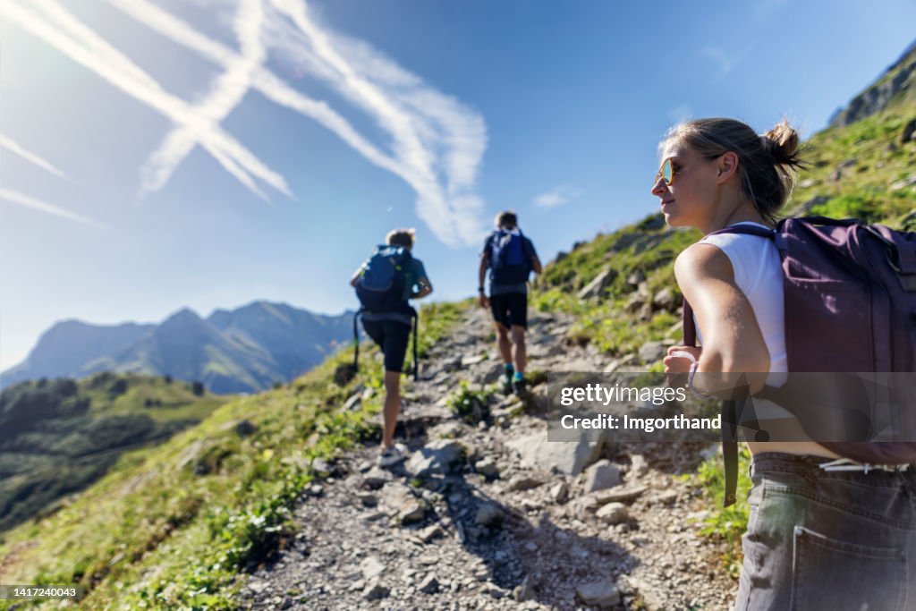 Teenagers hiking in the high mountains of Austria (Alps, Vorarlberg)