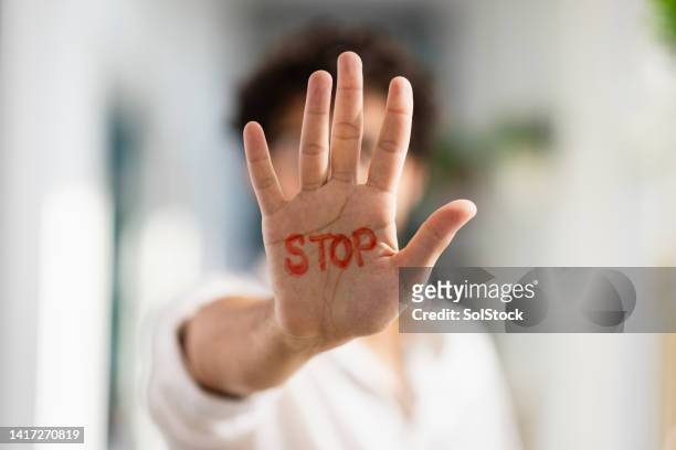 stop! - anti bullying symbols stock pictures, royalty-free photos & images