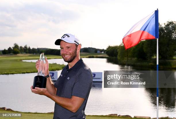 Maximilian Kieffer of Germany poses with the winners trophy after the final of the D+D Real Czech Masters at Albatross Golf Resort on August 21, 2022...