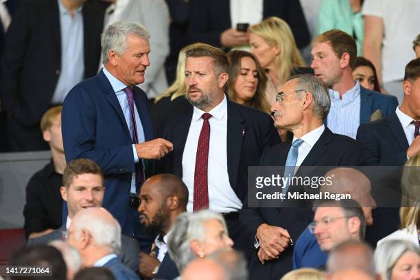 Chief Executive Officer of Manchester United Richard Arnold speaks with David Gill before the Premier League match between Manchester United and...