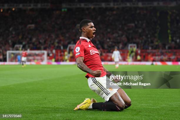 Marcus Rashford of Manchester United celebrates scoring a goal to make it 2-0 during the Premier League match between Manchester United and Liverpool...