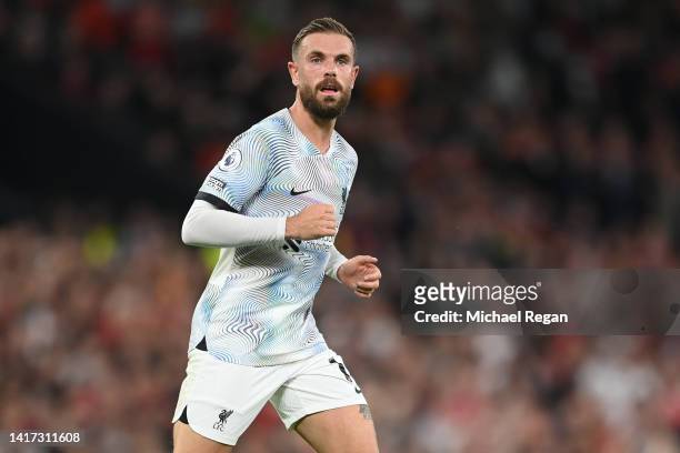 Jordan Henderson of Liverpool in action during the Premier League match between Manchester United and Liverpool FC at Old Trafford on August 22, 2022...