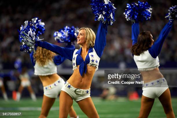 The Dallas Cowboys Cheerleaders perform during an NFL football game against the Minnesota Vikings, Sunday, Nov. 10 in Arlington, Texas.