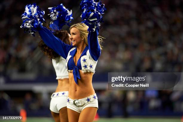 The Dallas Cowboys Cheerleaders perform during an NFL football game against the Minnesota Vikings, Sunday, Nov. 10 in Arlington, Texas.