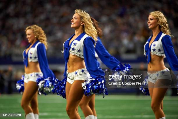 The Dallas Cowboys Cheerleaders perform during an NFL football game against the Minnesota Vikings, Sunday, Nov. 10 in Arlington, Texas.