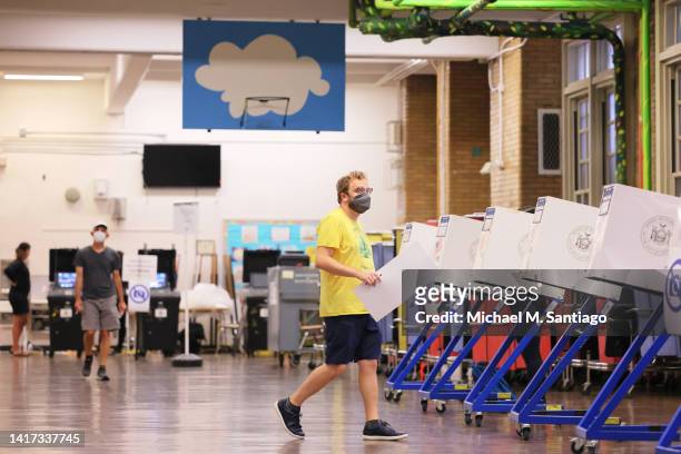 People vote during Primary Election Day at PS 10 on August 23, 2022 in the Park Slope neighborhood of Brooklyn borough in New York City. Residents of...