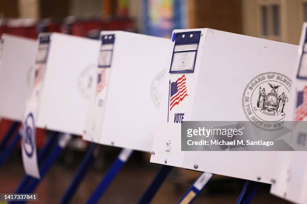 Empty voting booths are seen during Primary Election Day at PS 10 on August 23, 2022 in the Park Slope neighborhood of Brooklyn borough in New York...