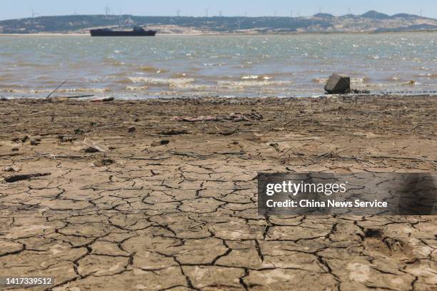 The lakebed of China's largest freshwater lake, Poyang, is exposed due to high temperatures and drought on August 22, 2022 in Lushan, Jiujiang City,...