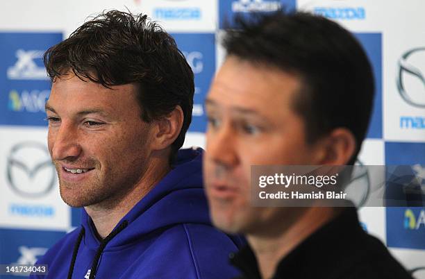 Brent Harvey of the Kangaroos and Australian cricket player Ricky Ponting speak to the media during a press conference at Aegis Park on March 23,...