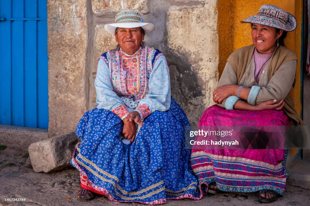 Two happy Peruvian women in national clothing, Chivay, Peru
