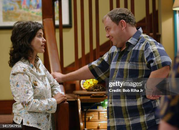 Actress Jami Gertz and Actor Mark Addy filming 1st episode of 'Still Standing' show, August 14, 2002 in Los Angeles, California.