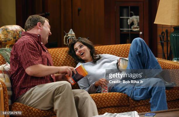 Actress Jami Gertz and Actor Mark Addy filming 1st episode of 'Still Standing' show, August 14, 2002 in Los Angeles, California.
