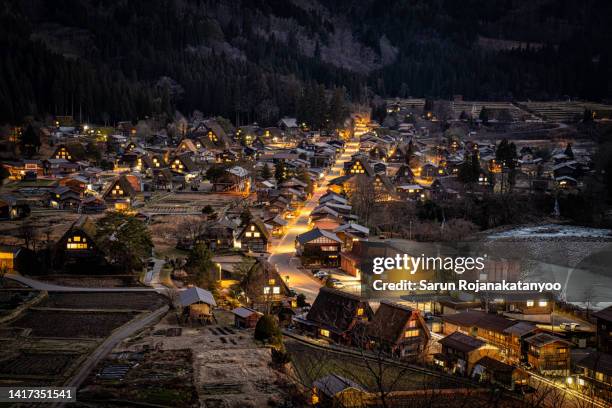 shirakawago night cityscape world heritage historic villages of shirakawa-go, japan - shirakawa go stock pictures, royalty-free photos & images