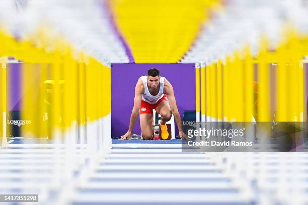 Andrew Pozzi of Team England competes during the Men's 110m Hurdles Round 1 on day five of the Birmingham 2022 Commonwealth Games at Alexander...