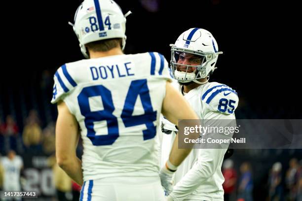 Eric Ebron of the Indianapolis Colts c85 visits with Jack Doyle of the Indianapolis Colts before an NFL football game against the Houston Texans,...