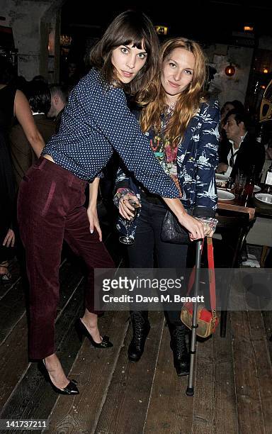 Alexa Chung and Josephine de la Baume attend a private dinner celebrating the Spring/Summer issue of Another Man magazine and the UK launch of BLK...