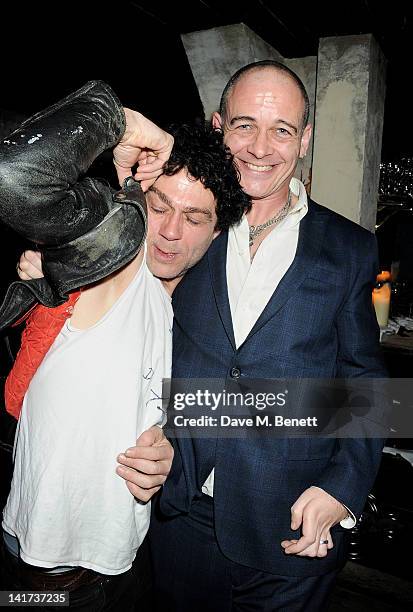 Tim Noble and Dinos Chapman attend a private dinner celebrating the Spring/Summer issue of Another Man magazine and the UK launch of BLK DNM at...