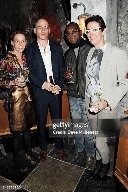 Tiphaine de Lussy, Dinos Chapman, Dennis Morris and Isabelle Chalard attend a private dinner celebrating the Spring/Summer issue of Another Man...