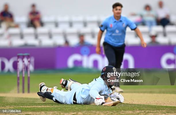 Billy Godleman of Derbyshire is run out by Ricardo Vasconcelos of Northamptonshire off the bowling of James Sales of Northamptonshire during the...