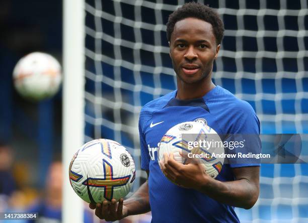 Raheem Sterling looks on during a Chelsea Training Session at Stamford Bridge on August 23, 2022 in London, England.