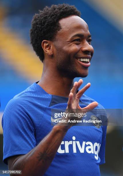 Raheem Sterling looks on during a Chelsea Training Session at Stamford Bridge on August 23, 2022 in London, England.