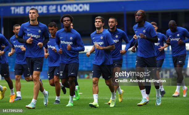 Chelsea players take to the pitch during a Chelsea Training Session at Stamford Bridge on August 23, 2022 in London, England.