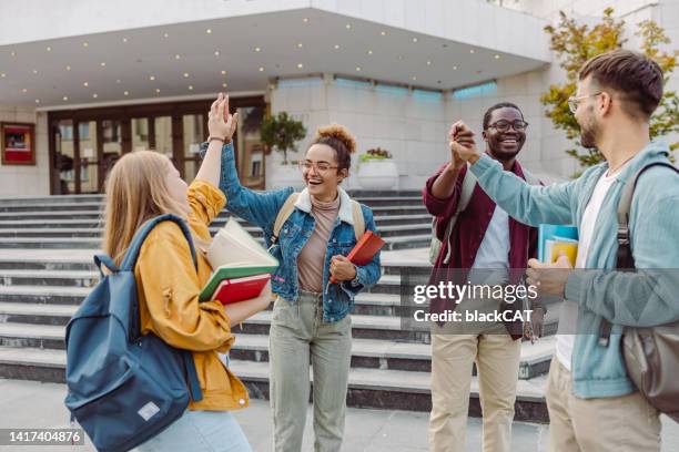 Teamwork In University Successful Teamwork Of University Students High-Res Stock Photo - Getty ...