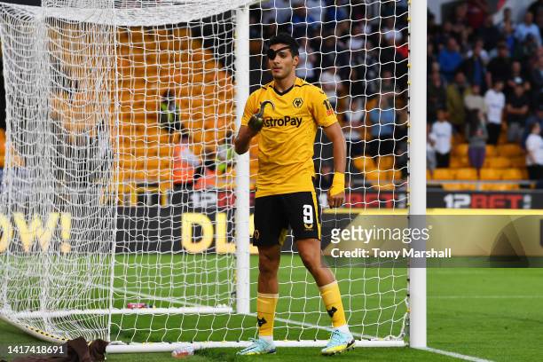 Raul Jimenez of Wolverhampton Wanderers scores their team's first goal while wearing eye patch and pirates hook during the Carabao Cup Second Round...