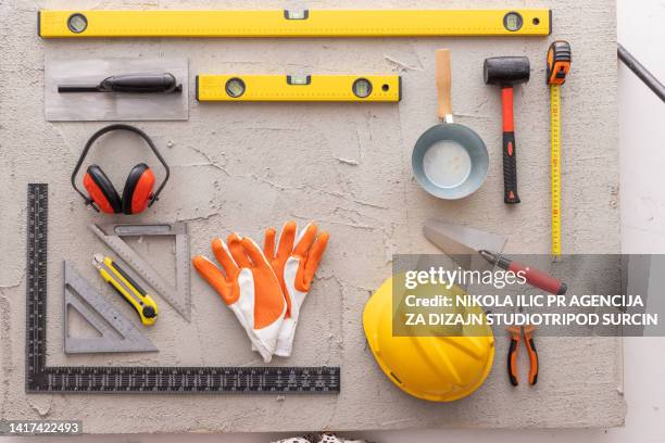 construction tools on concrete background copy space stock photo - house rules stock pictures, royalty-free photos & images