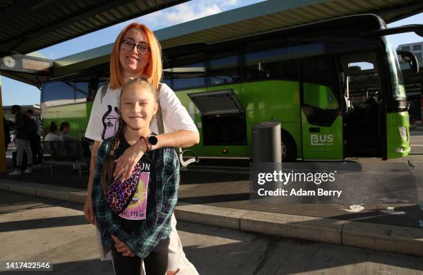 Ukrainian refugee Nastiia Taranenko poses with her niece Polina Nazarenko prior to their departure back to their home country at the main bus station...