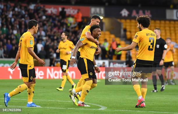 Adama Traore of Wolverhampton Wanderers celebrates with teammates after scoring their team's second goal during the Carabao Cup Second Round match...